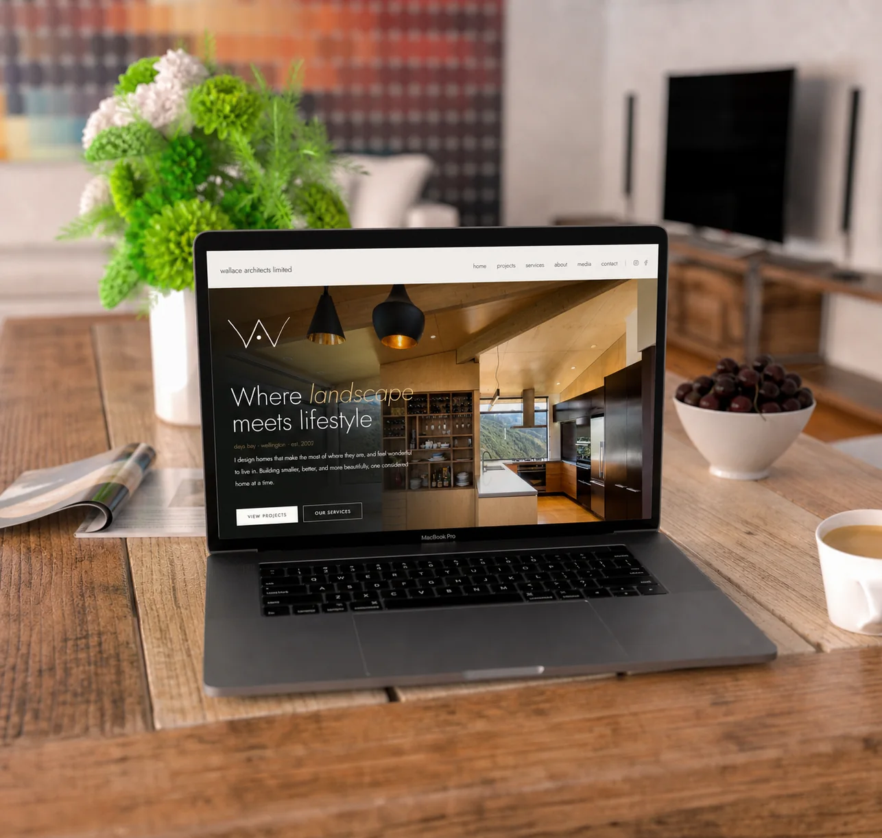 Laptop showing the Wallace Architects homepage