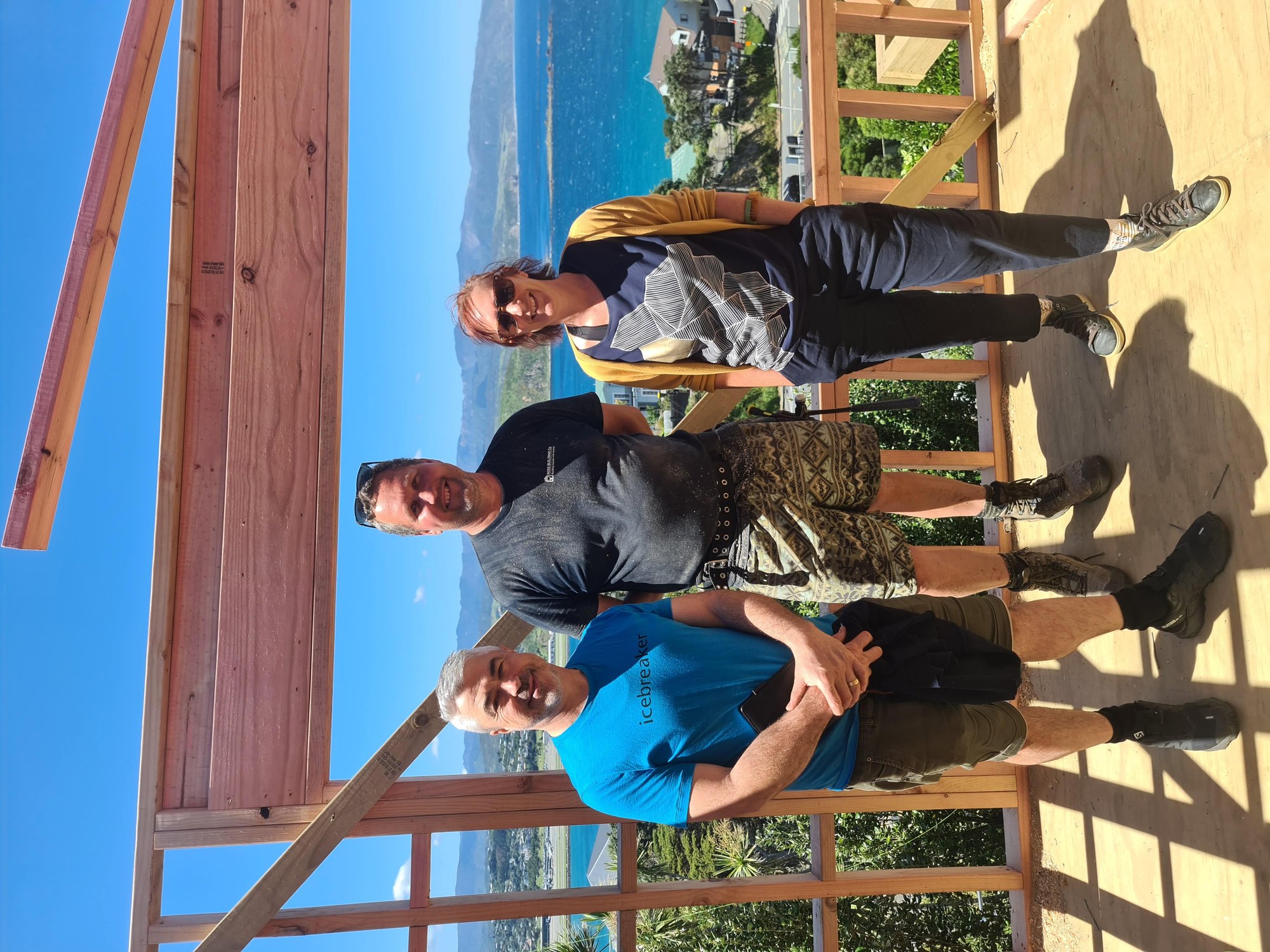 Liz Wallace on site with client and builder